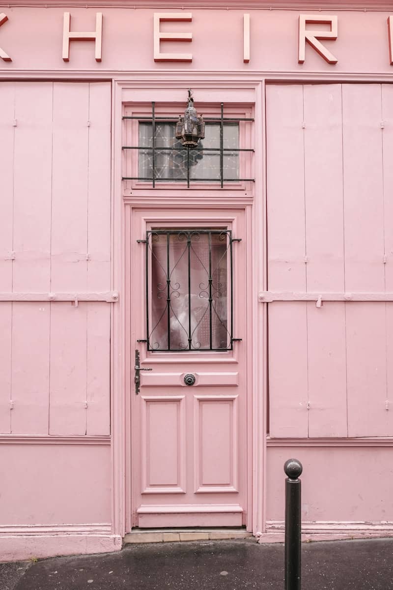 A pretty pink doorway catches the eye.