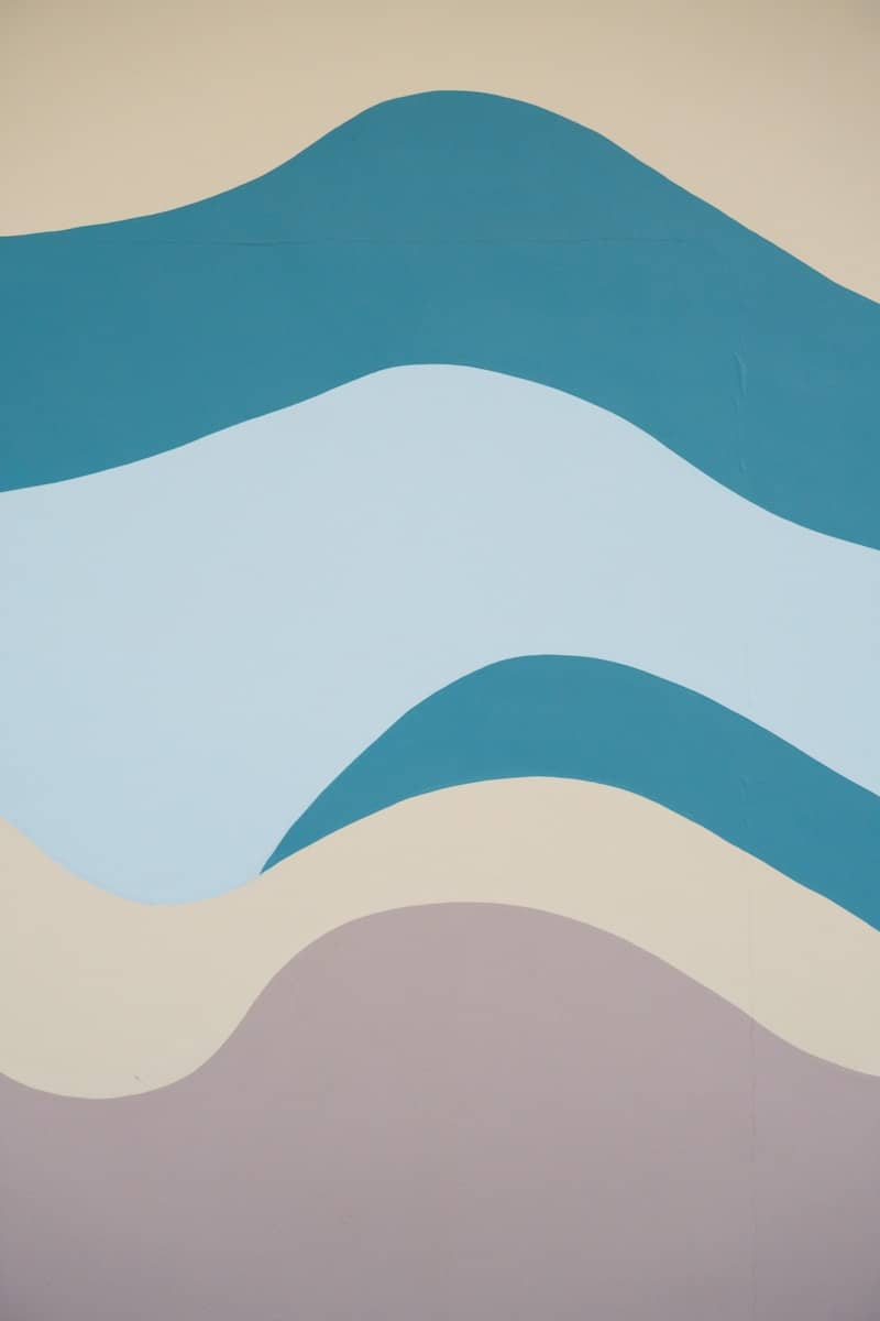 Abstract wavy lines in muted earth tones and blues