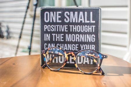 Photo by Binti Malu: https://www.pexels.com/photo/photo-of-a-sign-and-eyeglasses-on-table-1485657/
