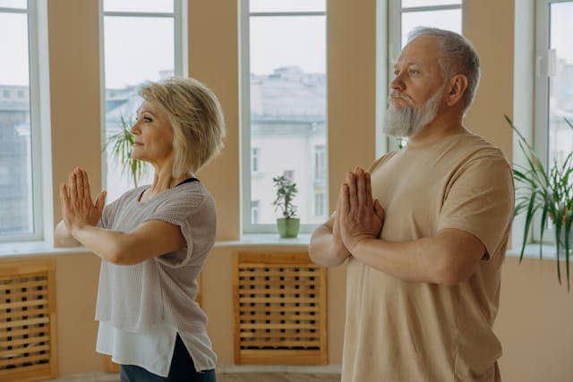 Photo by Mikhail Nilov: https://www.pexels.com/photo/a-man-and-a-woman-doing-the-prayer-pose-7500316/