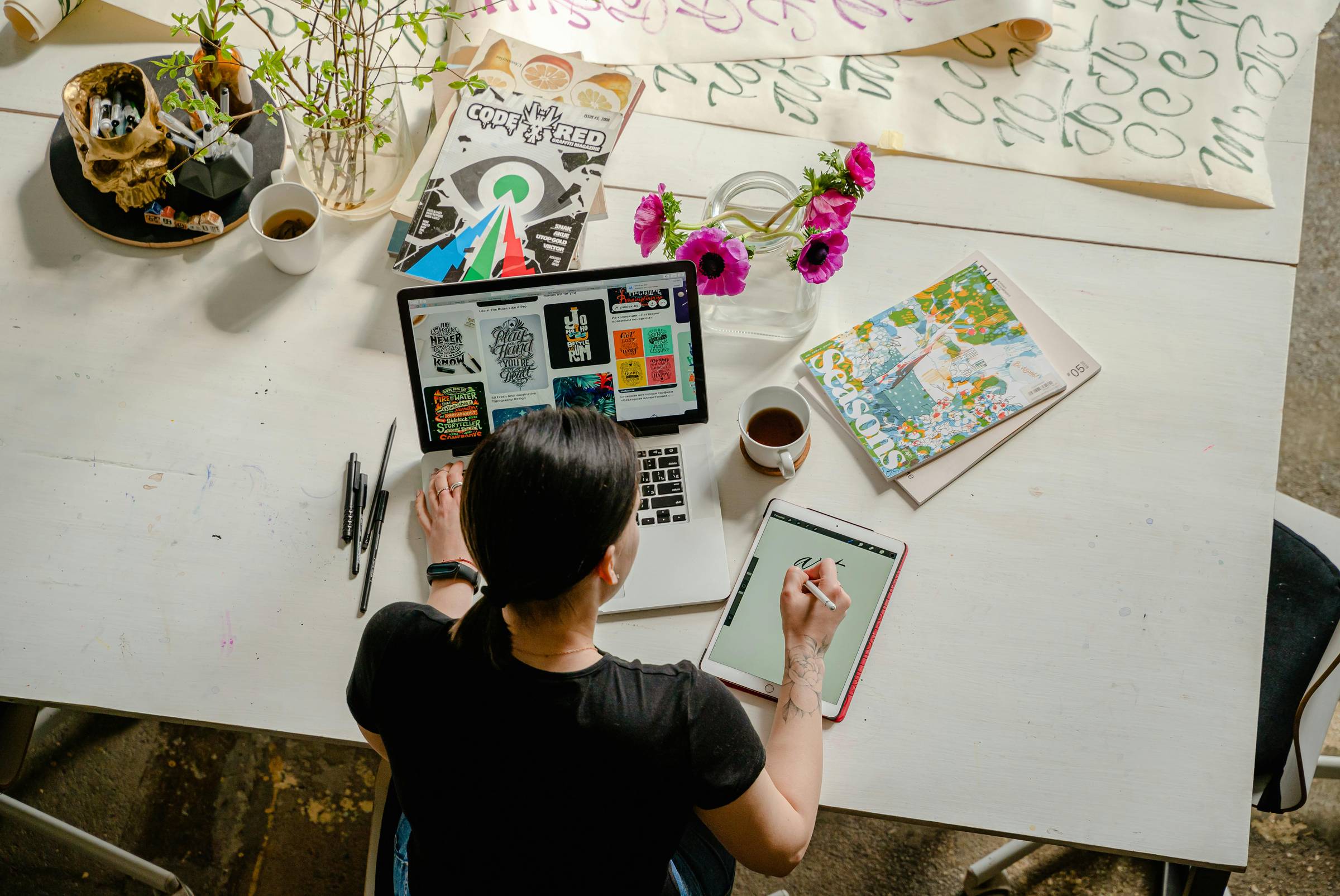 Photo by Antoni Shkraba Studio: https://www.pexels.com/photo/photo-of-woman-writing-on-tablet-computer-while-using-laptop-4348401/