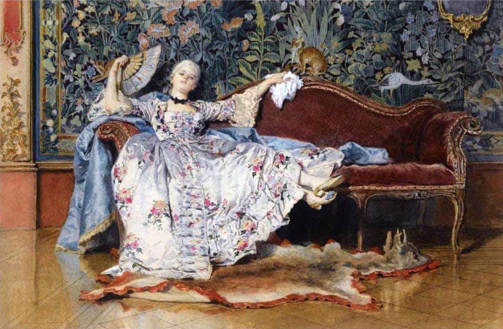 Royal-looking woman sitting on a luxurious couch and fanning herself.