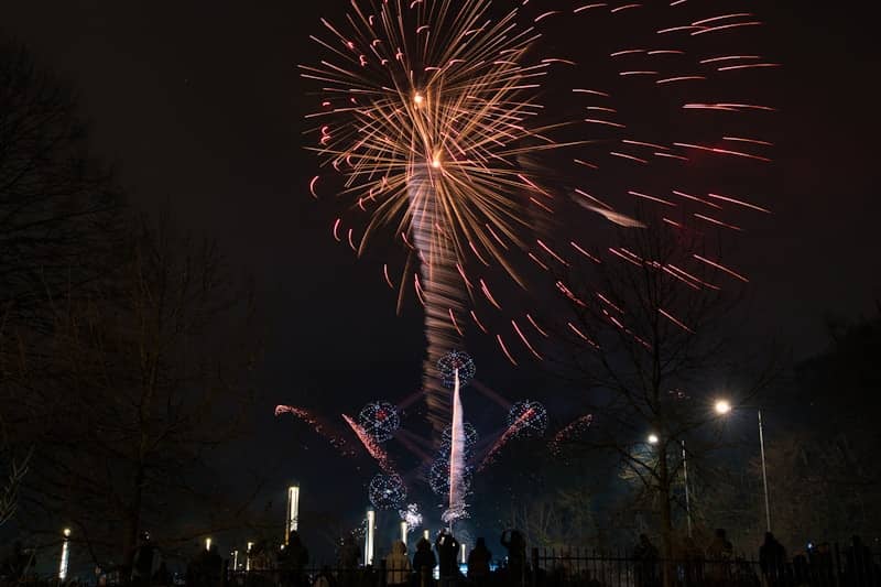 A large fireworks display in the night sky