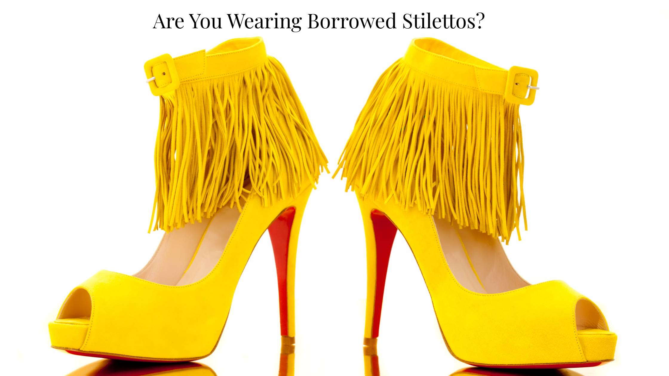 a pair of yellow stilletos with red bottoms with the caption are you wearing borrowed stillettos?