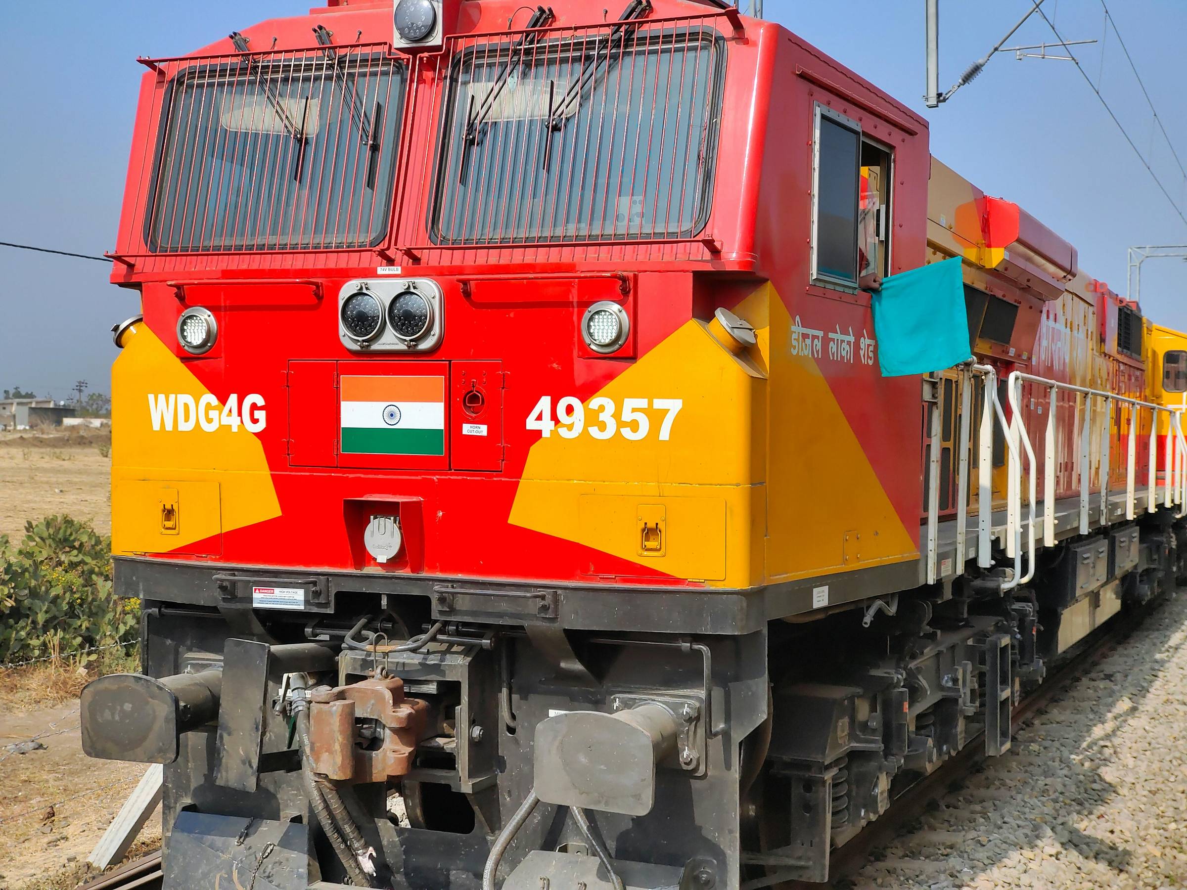 Front end of a red and yellow train