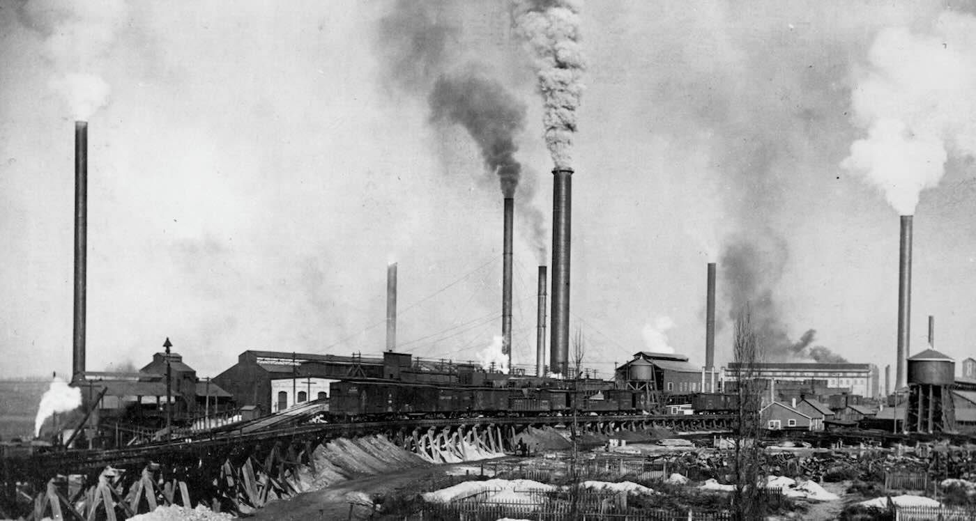 Black and white image of smoke stacks
