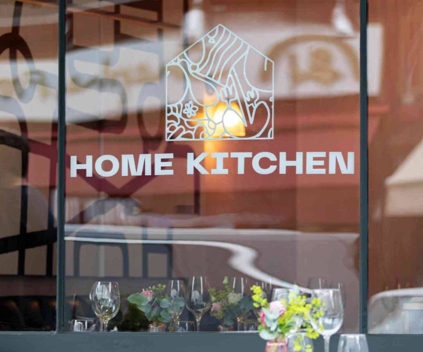 Home Kitchen logo on a window
