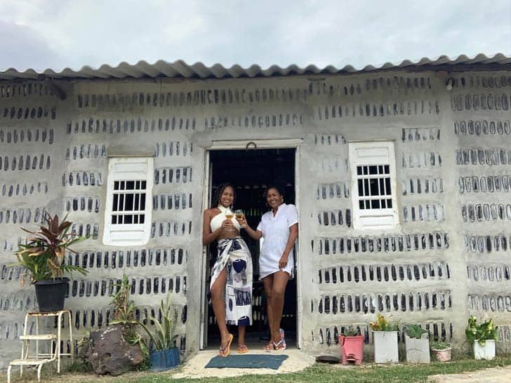 Mother and daughter standing in the doorway of Casa de Sal