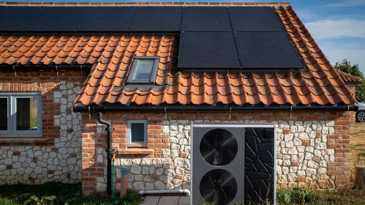 Solar panels on a clay roof of a house