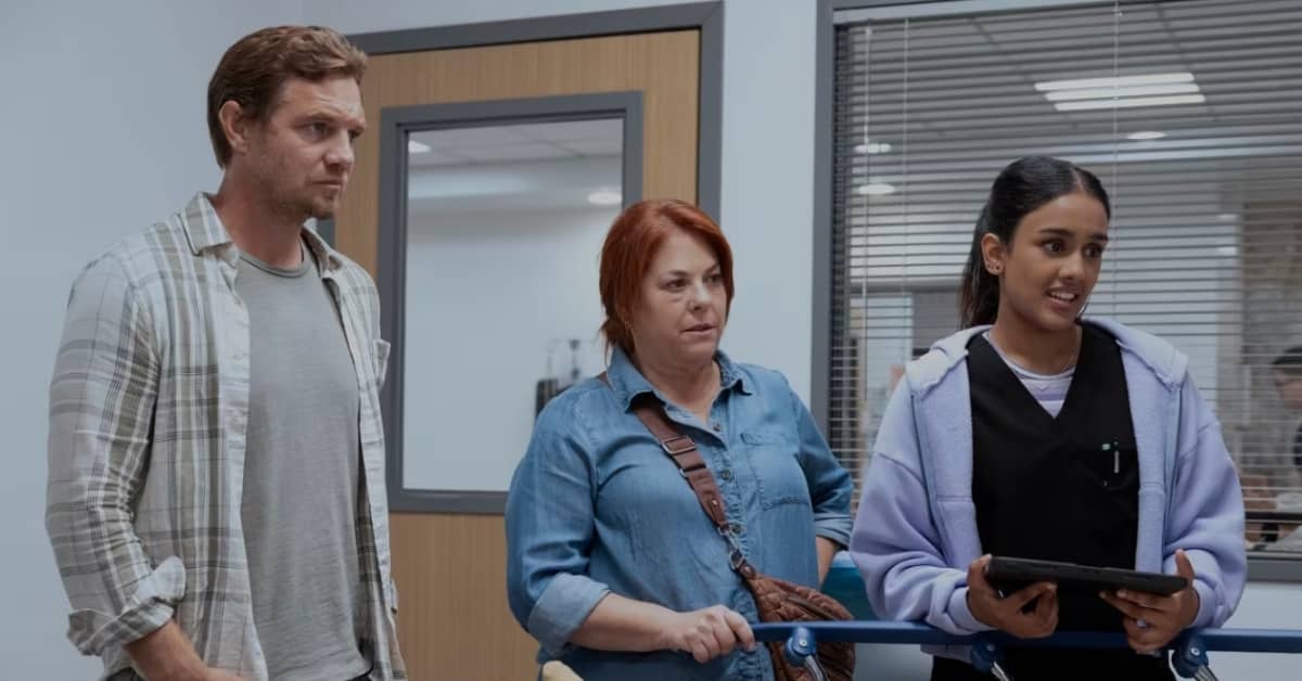 Three people in a hospital room