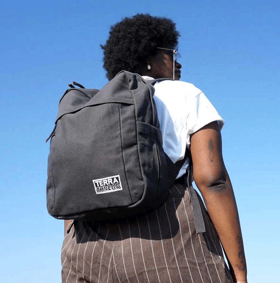 Person with a black backpack on