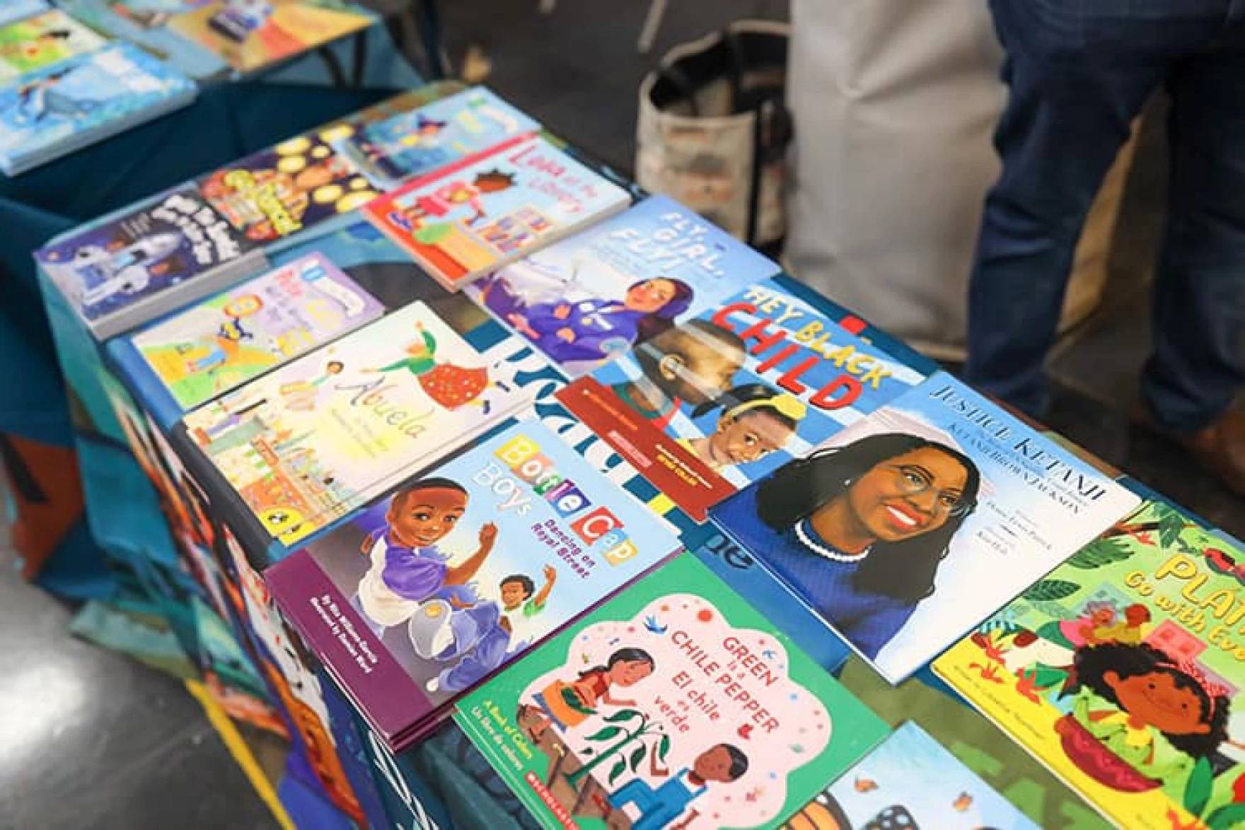 A table filled with diverse children's books