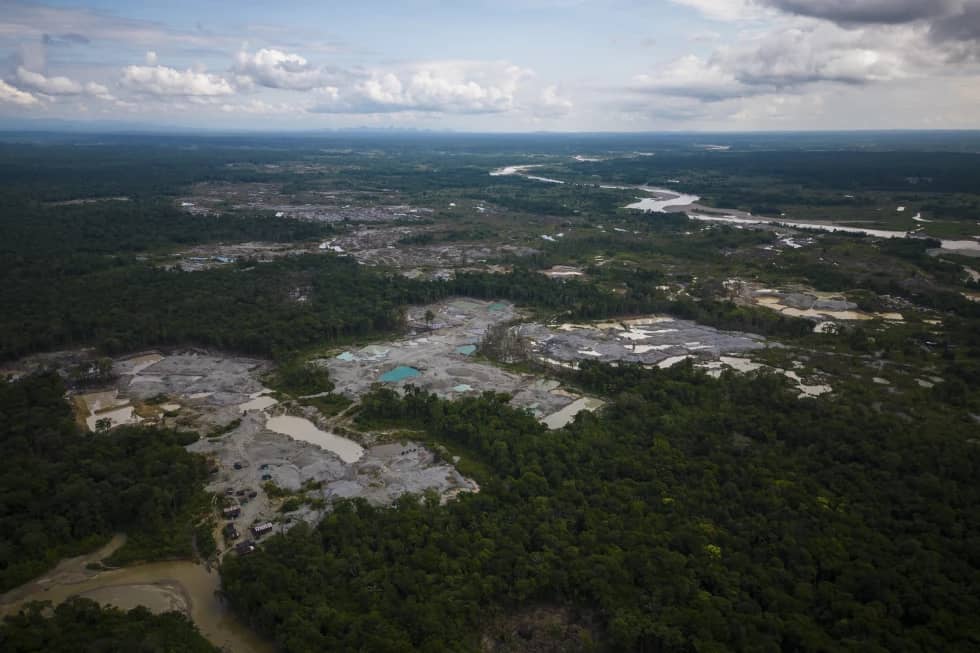 Birds-eye view of patches of illegal deforestation