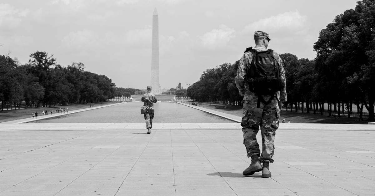 Two people in military clothing on the Washington Mall