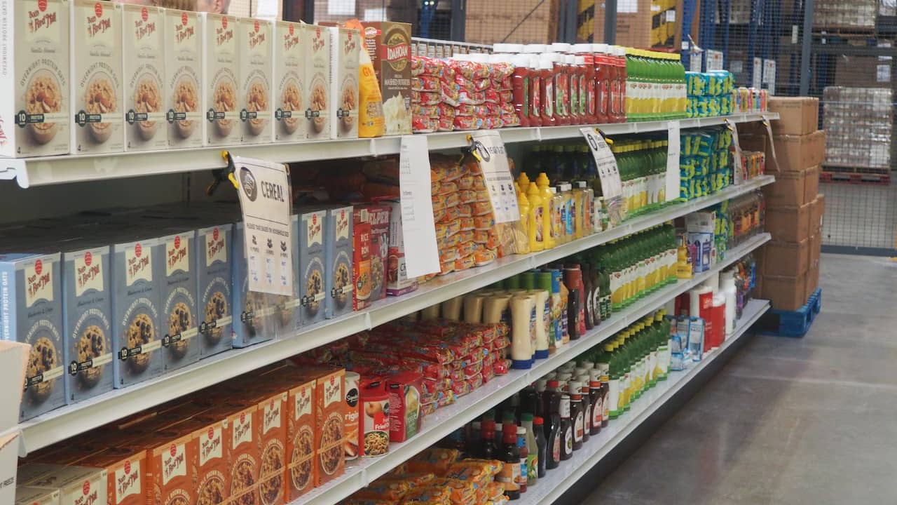 Grocery store shelves filled with boxes and containers of food