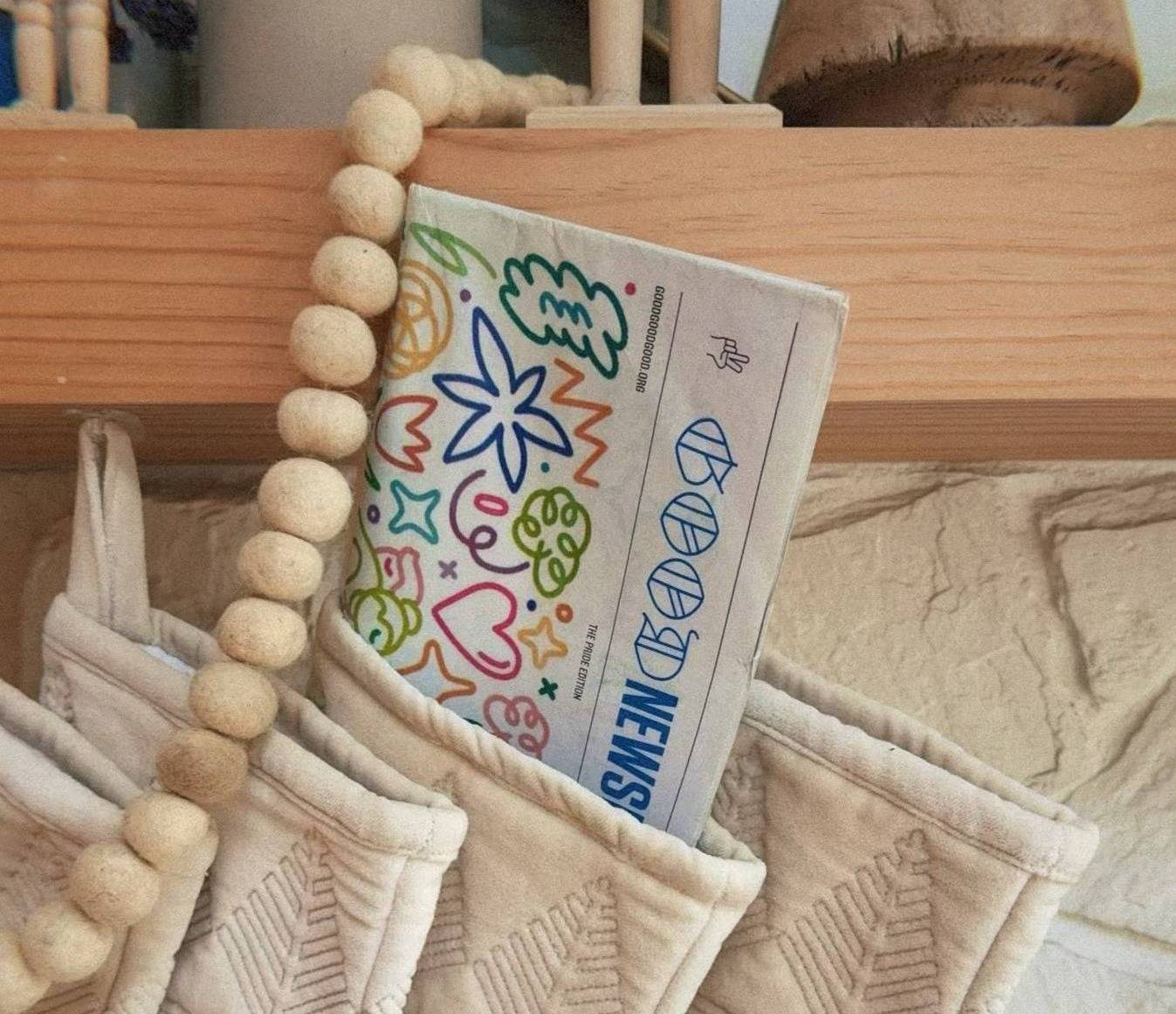 A Goodnewspaper in a white velvet stocking