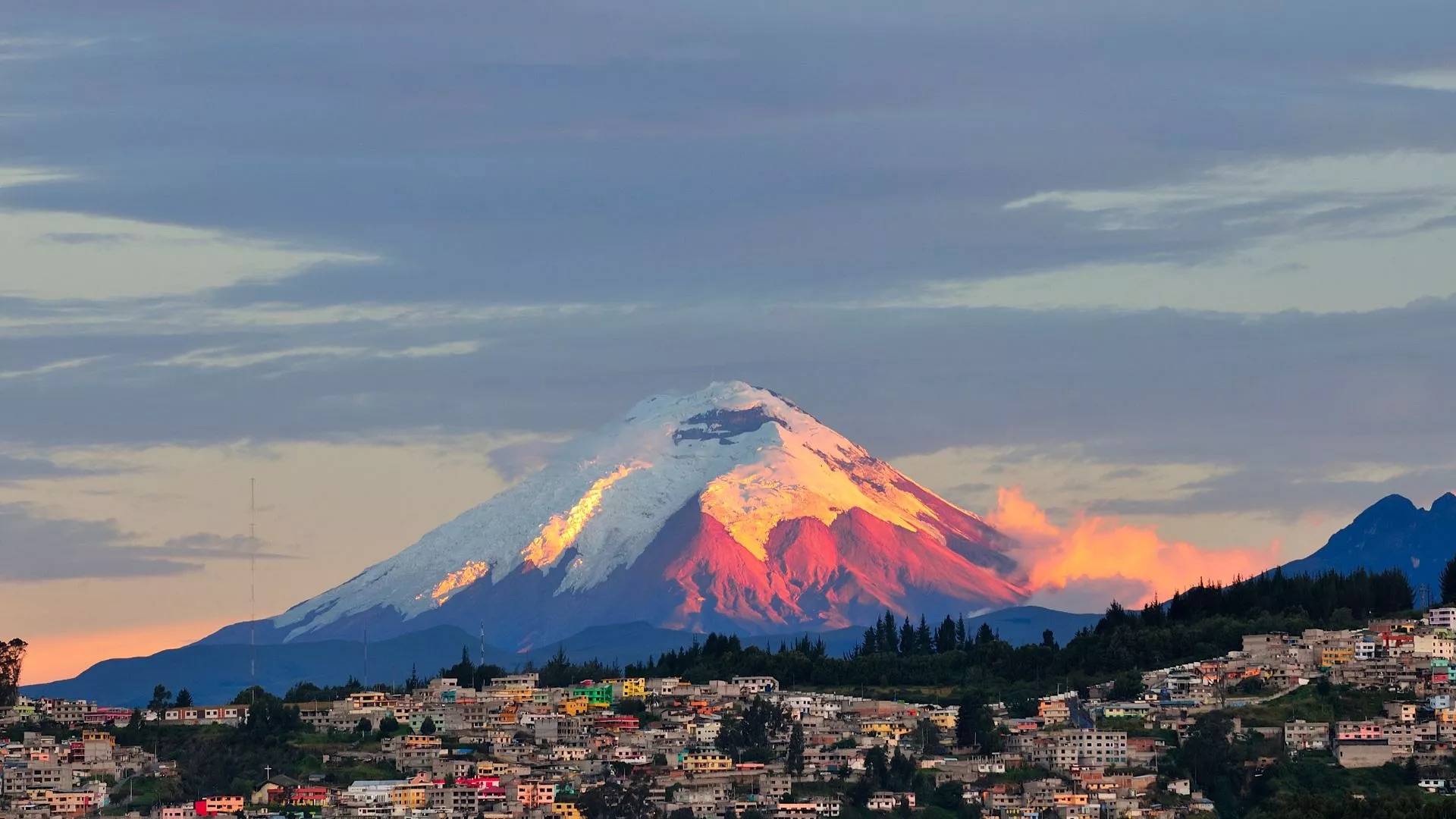 Ecuador's capital city of Quito with a snow-capped mountain in the background