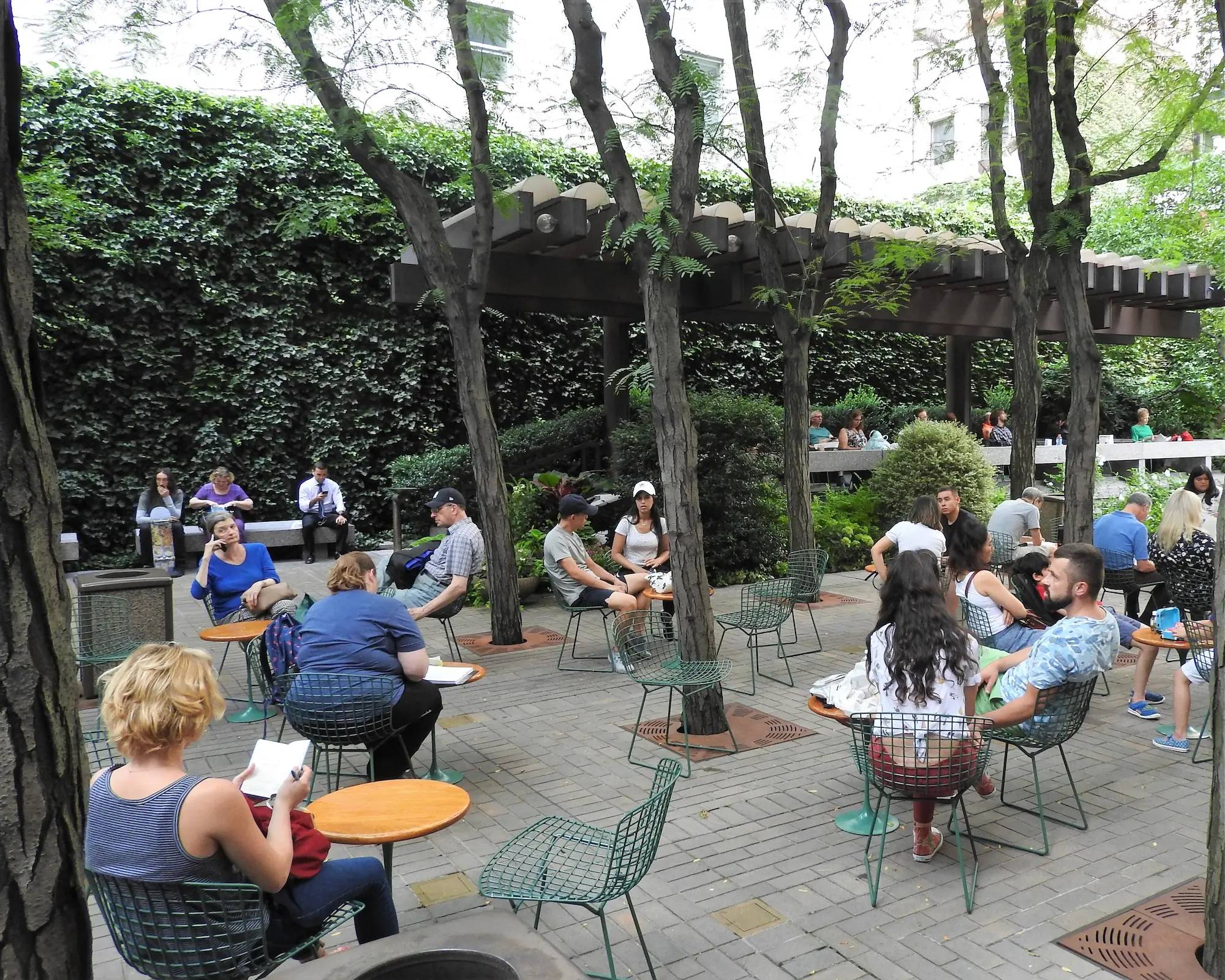 People sitting in an existing "pocket park"