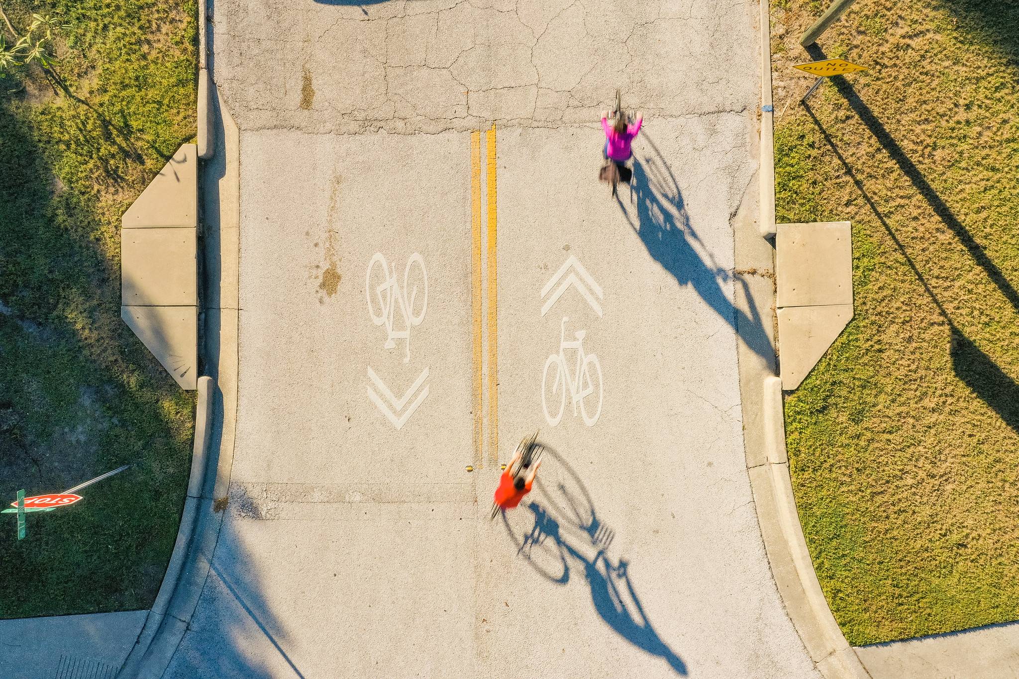 Aerial view of two bikers on a road 