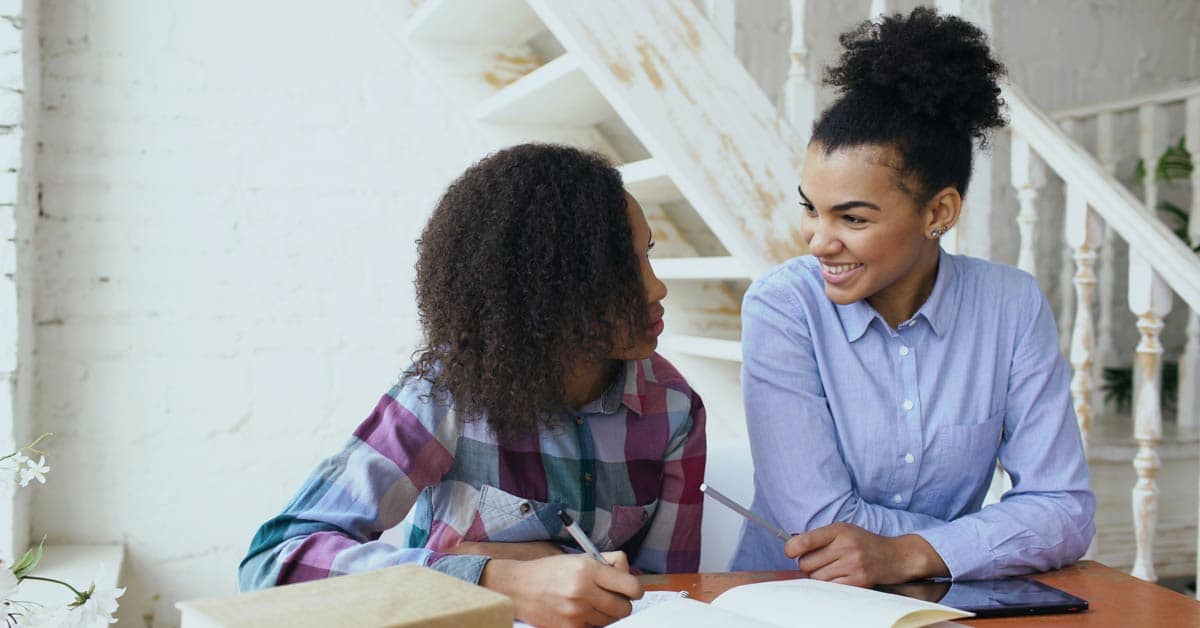 Two people sitting at a table