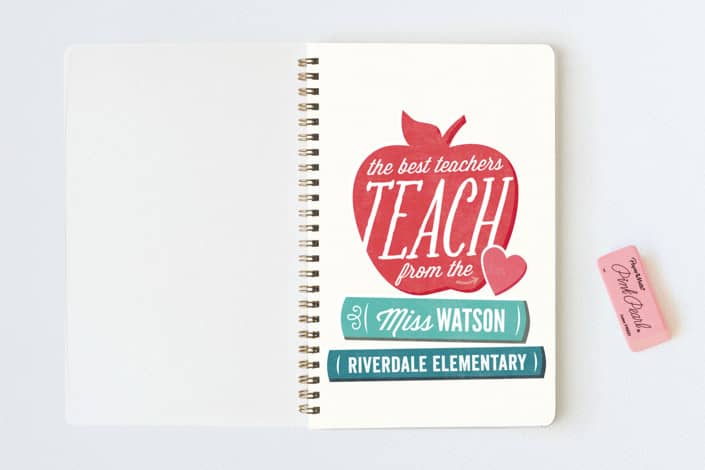 A spiral notebook open to a page that says "The Best teachers teach from the heart. Miss Watson. Riverdale Elementary"