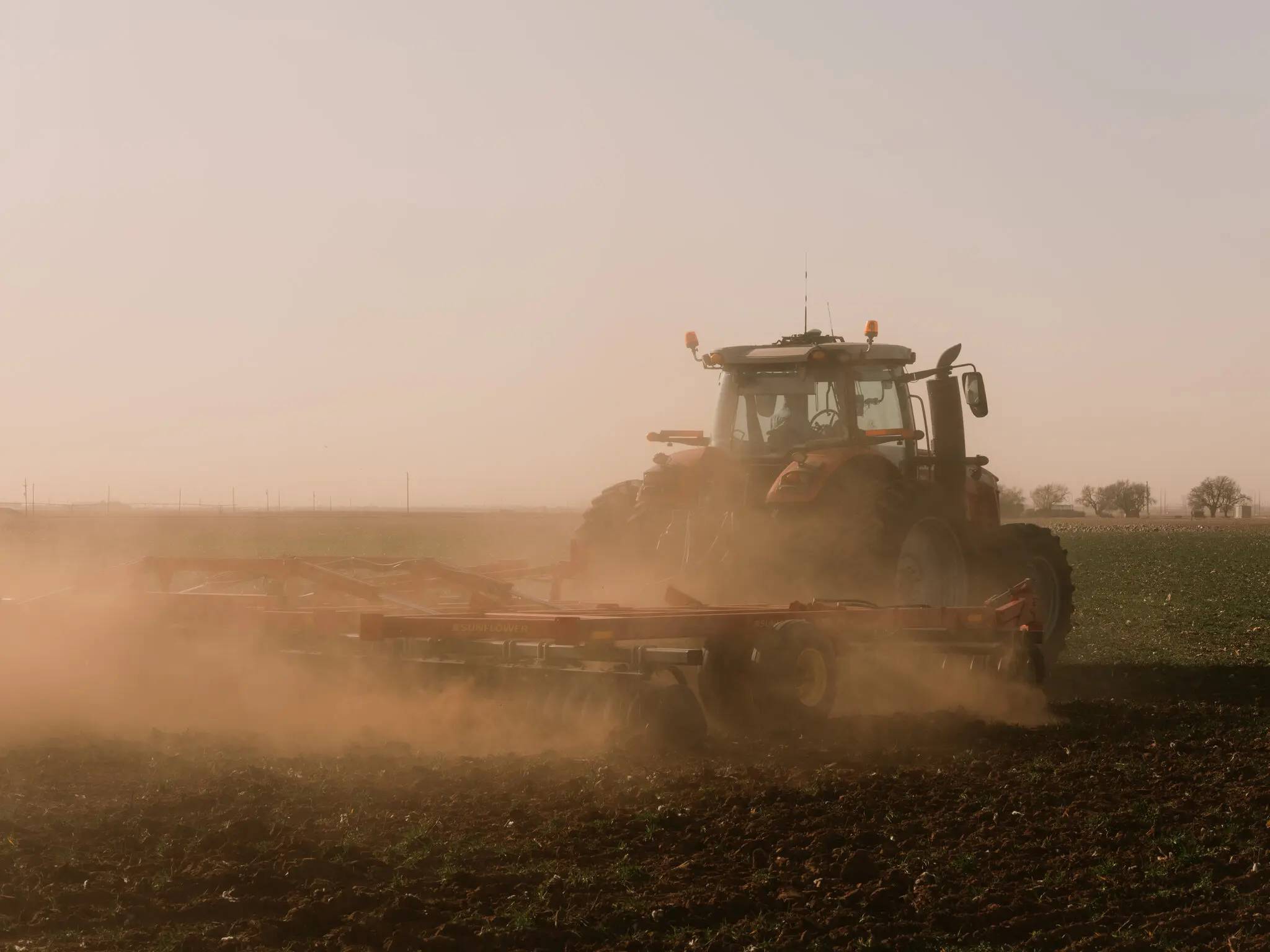 Tractor in a dirt field
