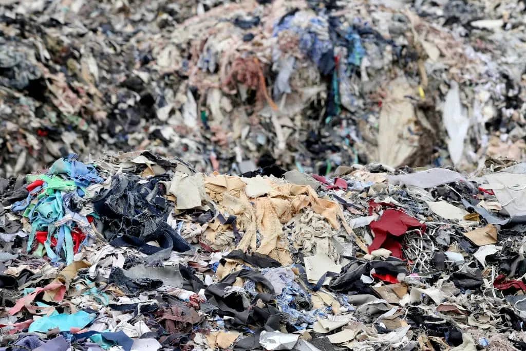 Piles of textiles in a landfill