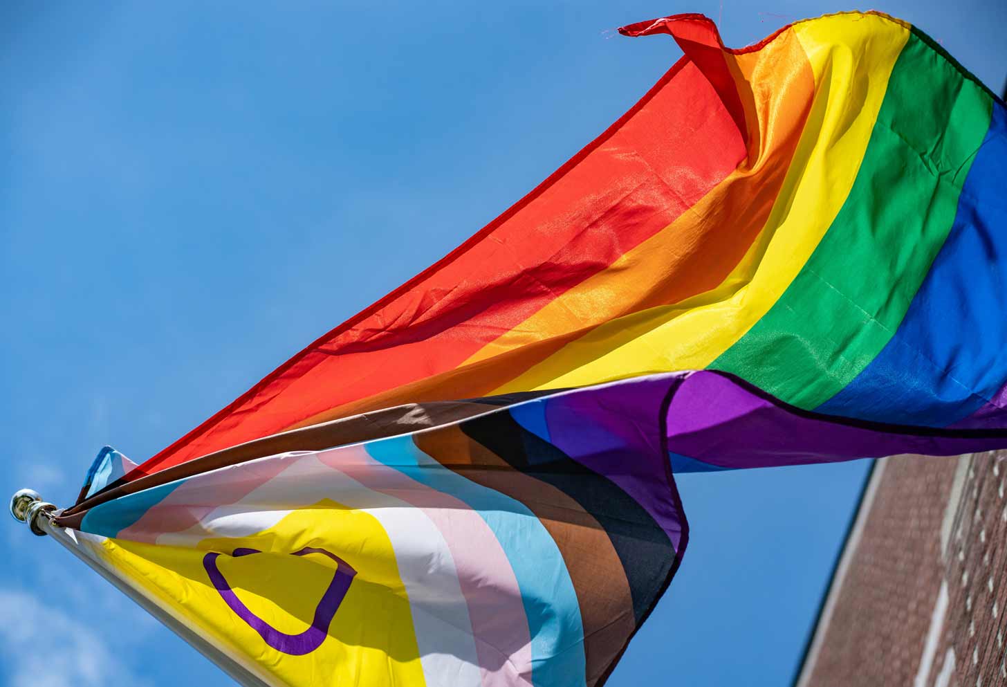 Progress pride flag blowing in the wind