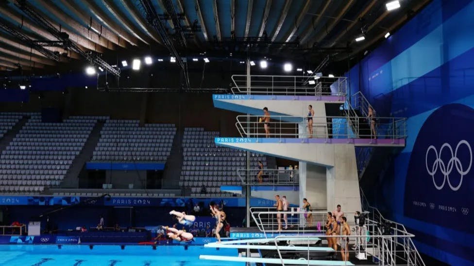 Inside of the new Olympic aquatic center, whose massive roof is covered in solar panels