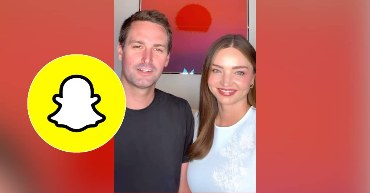Screenshot of two people smiling at the camera, an inset of the yellow and white snapchat logo is inset in a circle