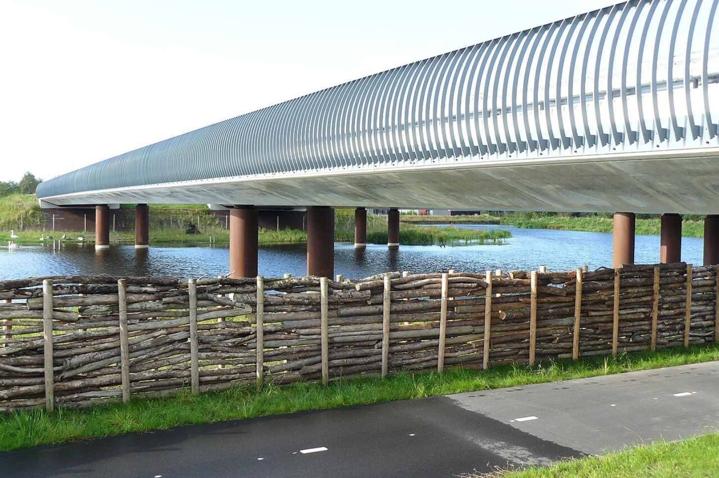 A metal bridge over a body of water