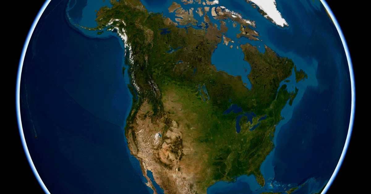 Globe seen from space, with glow around it, North America is in the center of the photo