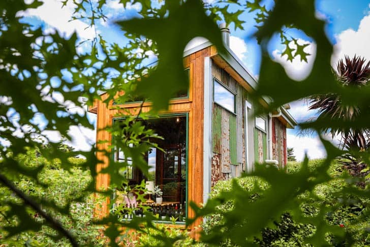 Exterior of a wood, and corrugated-metal tiny house