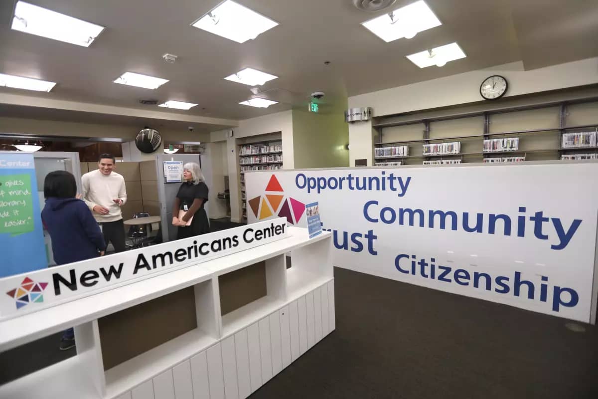 New Americans Center table inside a library