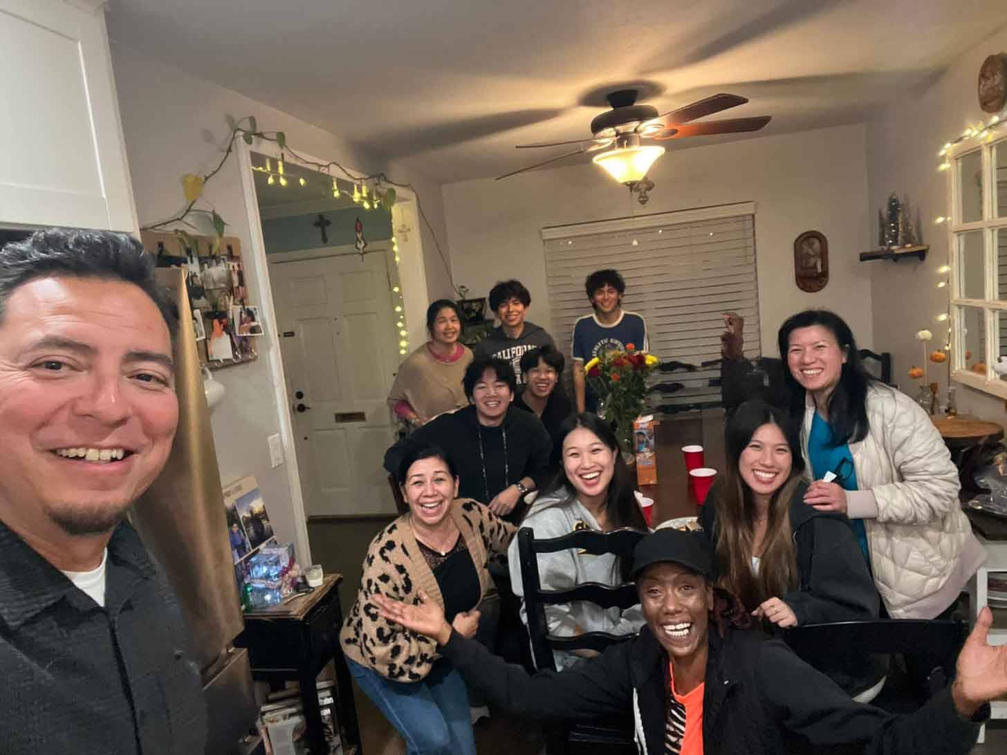 Selfie of a group of people inside a dining room