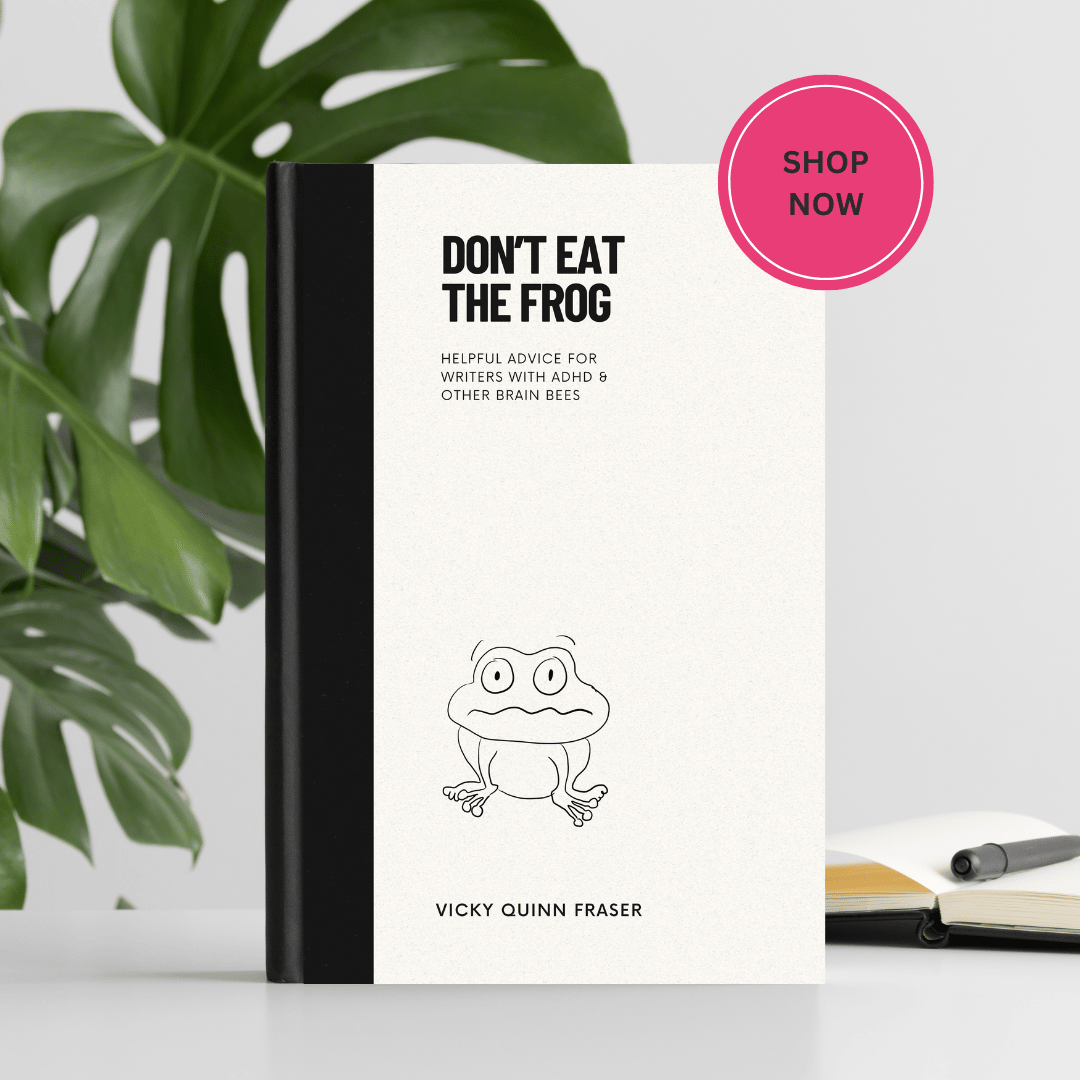 Image of the book “Don’t Eat the Frog” in front of a cheese plant and a notebook.