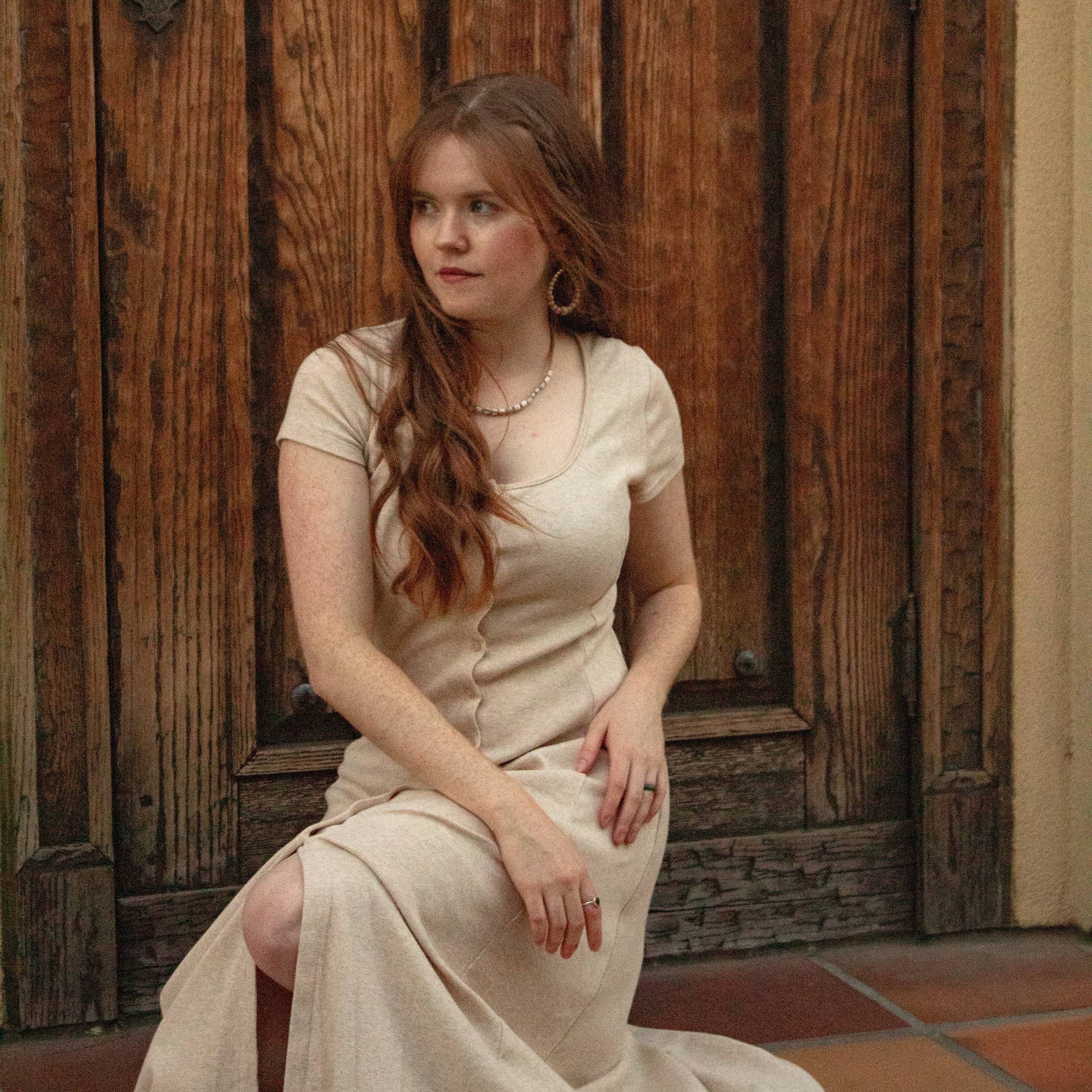 woman in white button up shirt