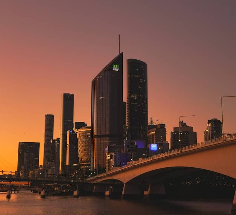 City skyline with bridge at sunset