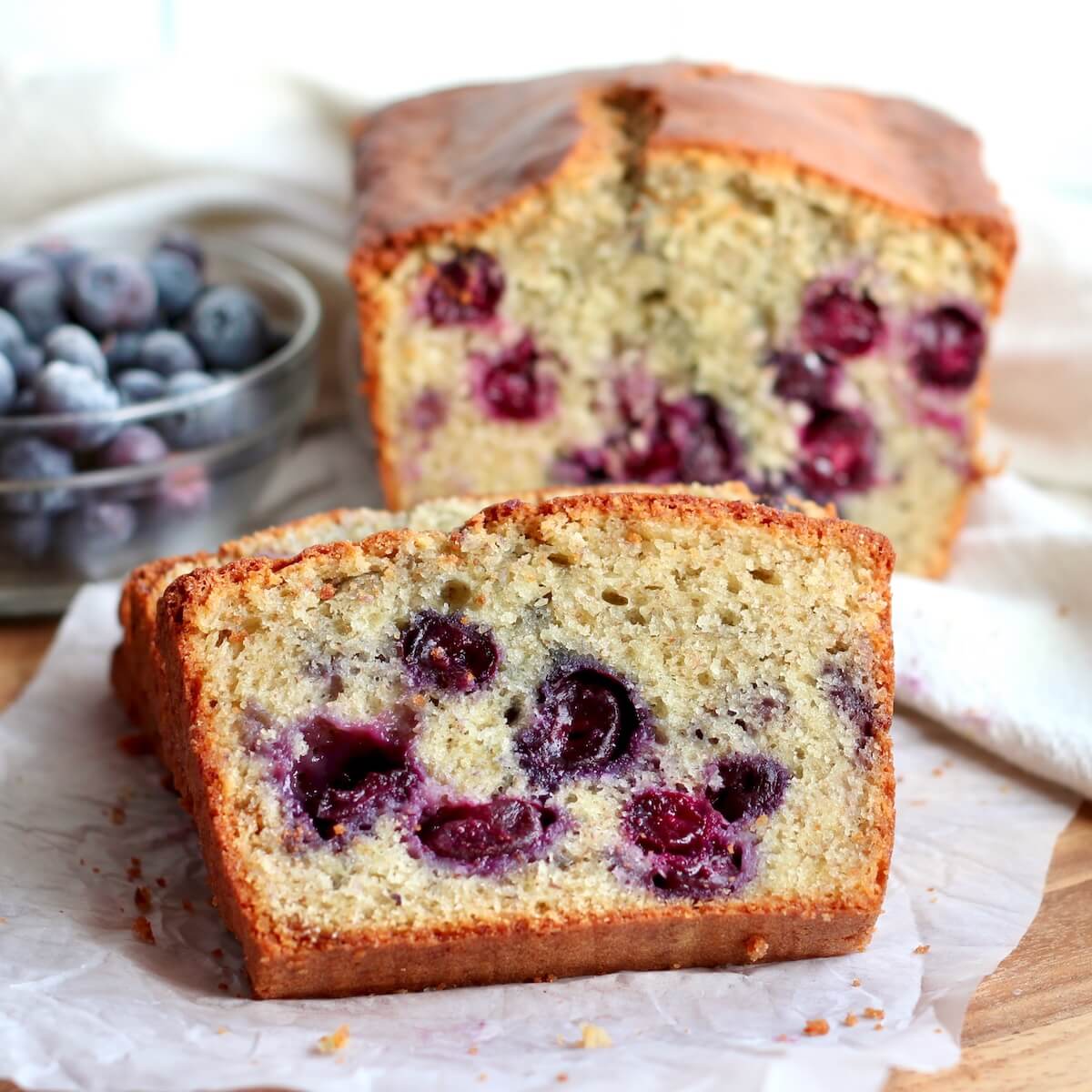 A loaf of sourdough blueberry quick bread.