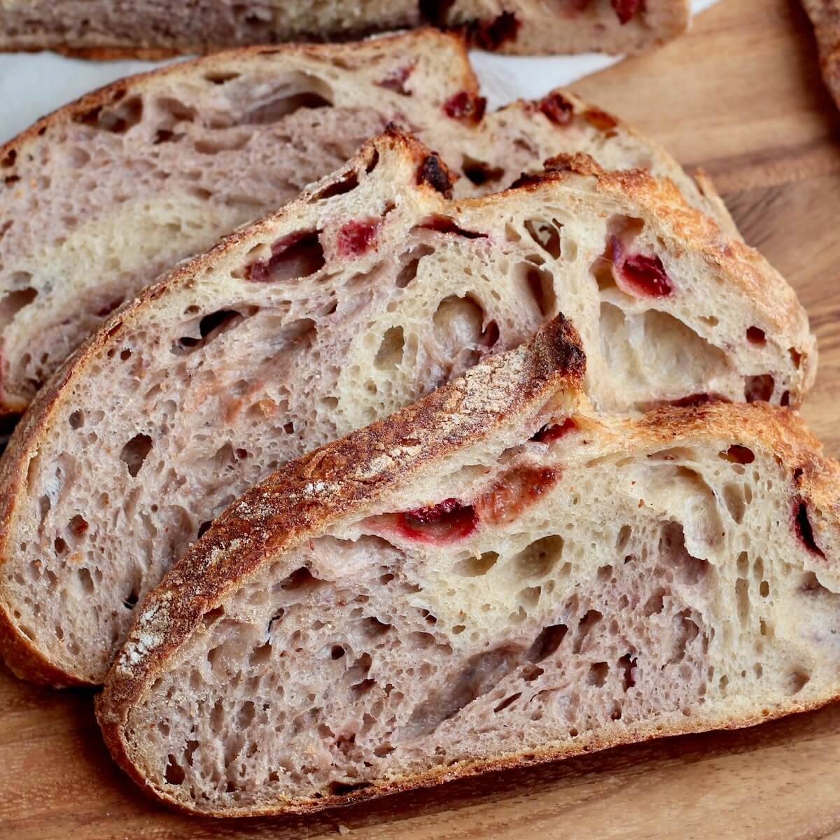 Slices of freeze-dried strawberry swirl sourdough bread.