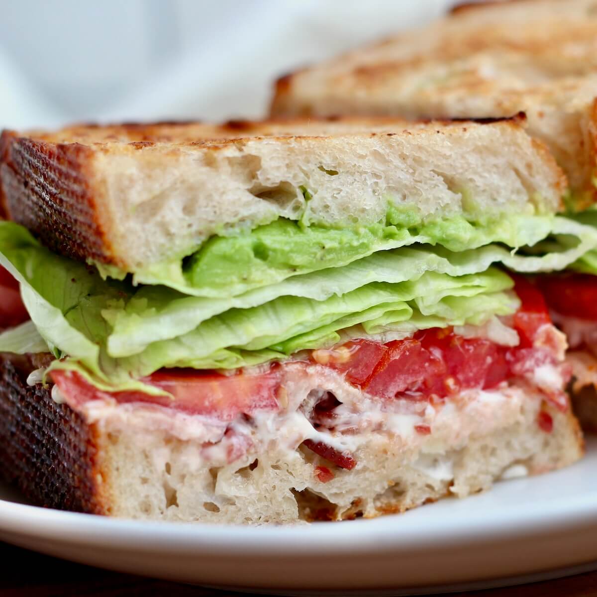 A BLT sandwich on sourdough bread.