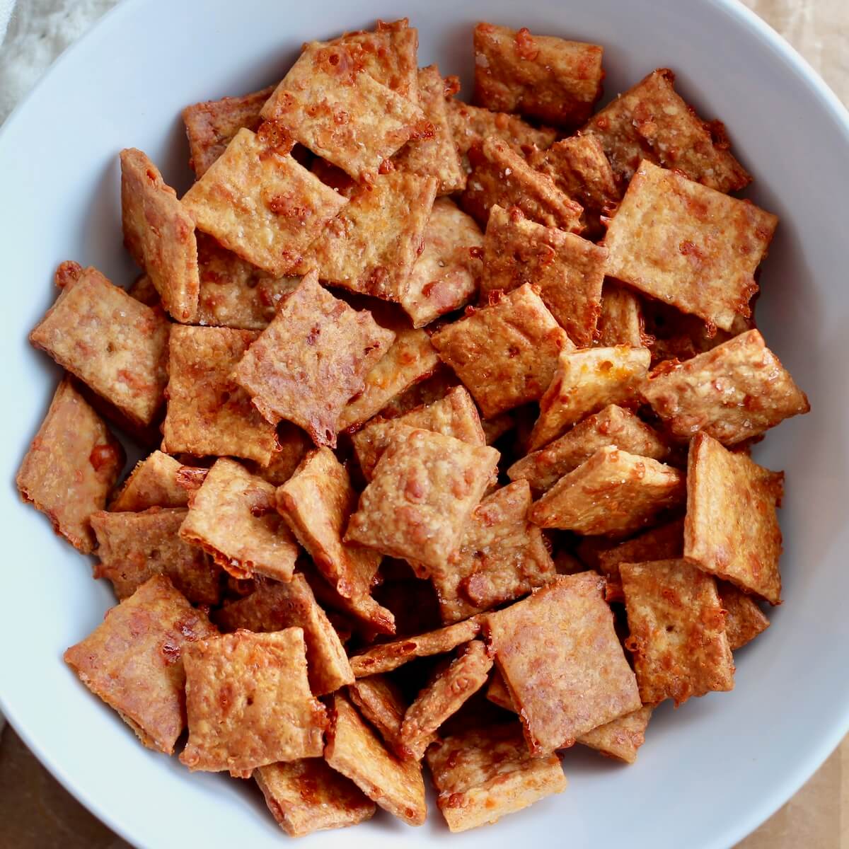 A bowl of sourdough discard cheese crackers.