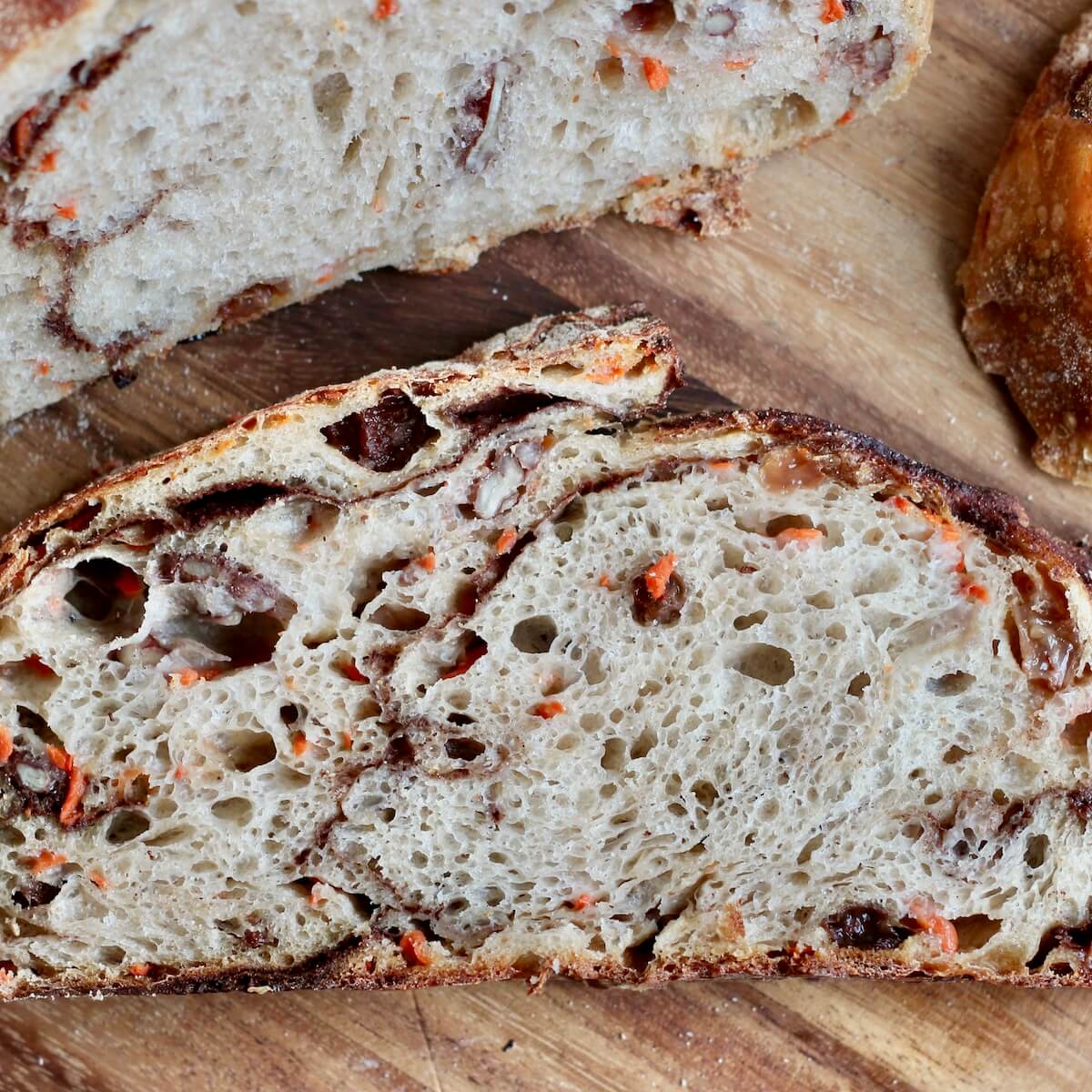 A slice of carrot cake sourdough bread.