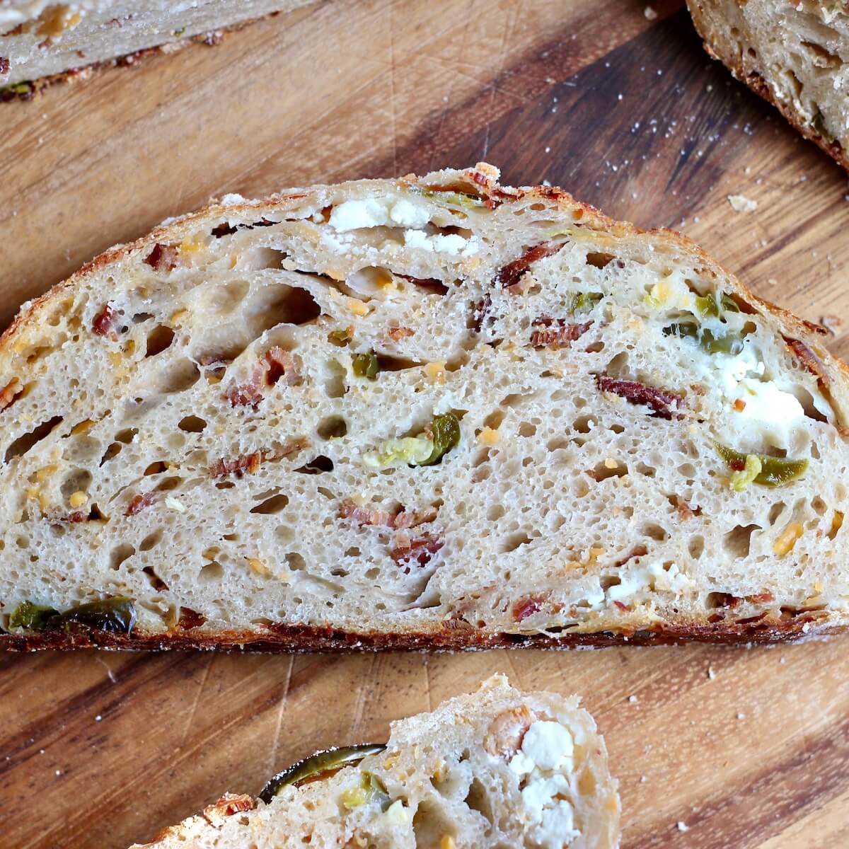 A slice of jalapeño popper sourdough bread.