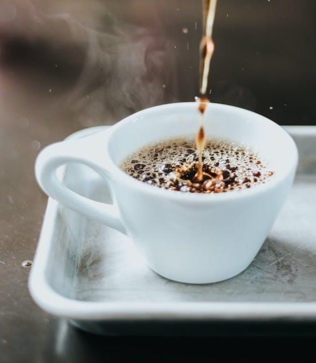 time lapse photography of coffee on cup