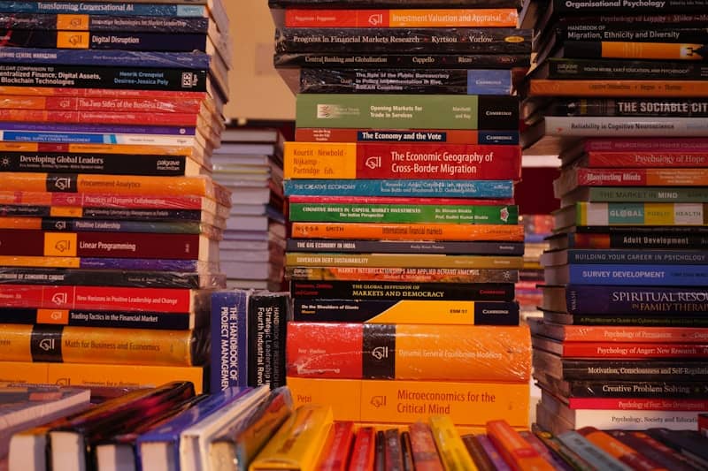 A stack of books sitting on top of a table