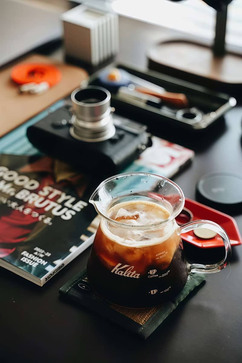Iced coffee in a glass carafe on a table