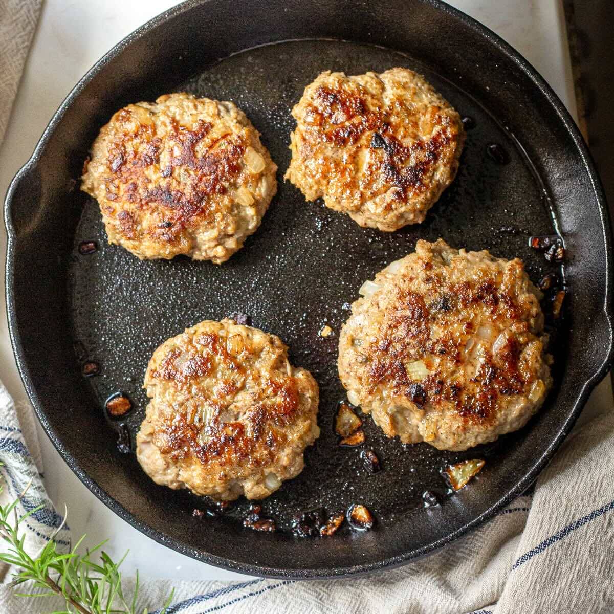 Juicy turkey burgers on a cast-iron grill pan