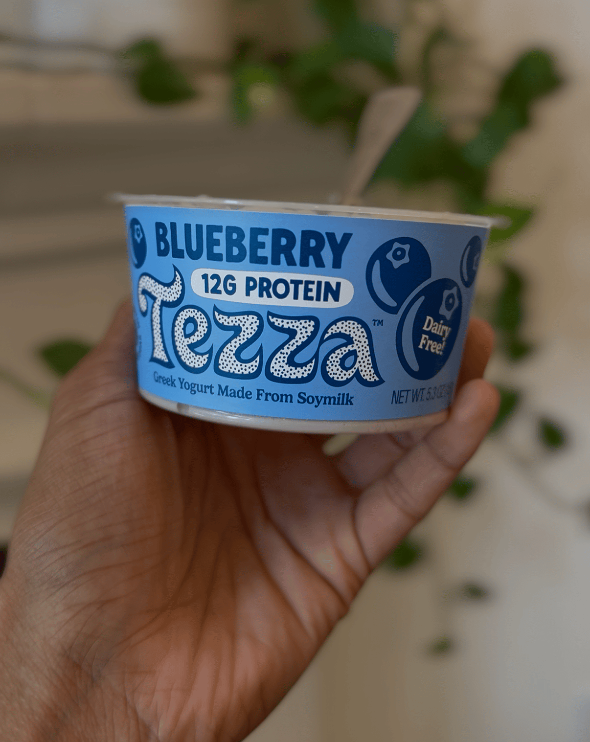 Blue yogurt container with soy milk based Greek yogurt called Tezza