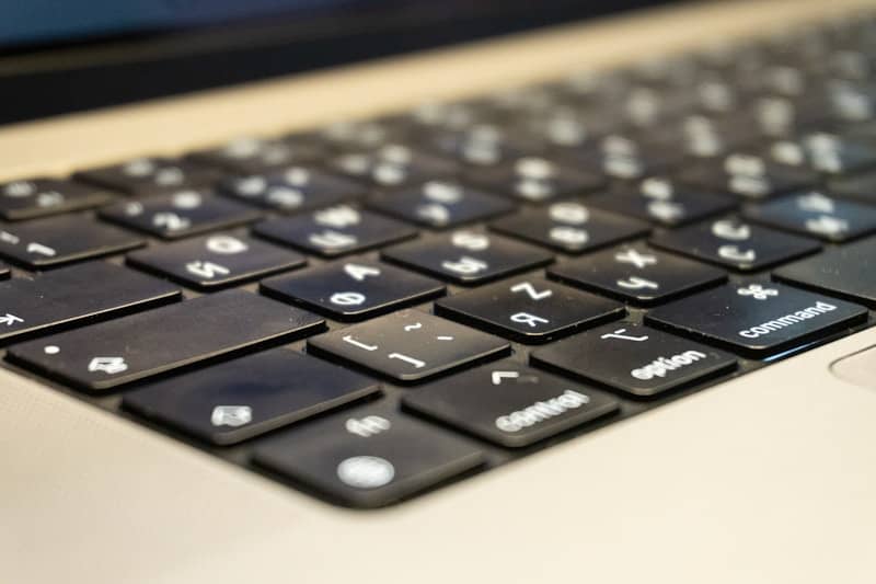 Keyboard keys are close up and in focus.